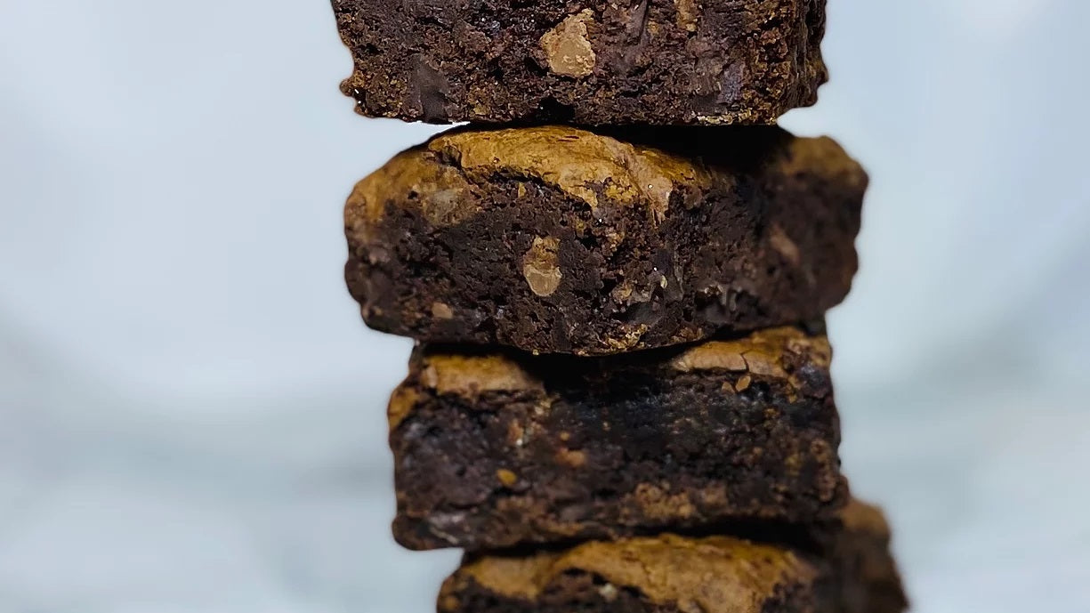 The OG brownie close up stack of thick fudge brownies Ditch The Mix Columbus Ohio